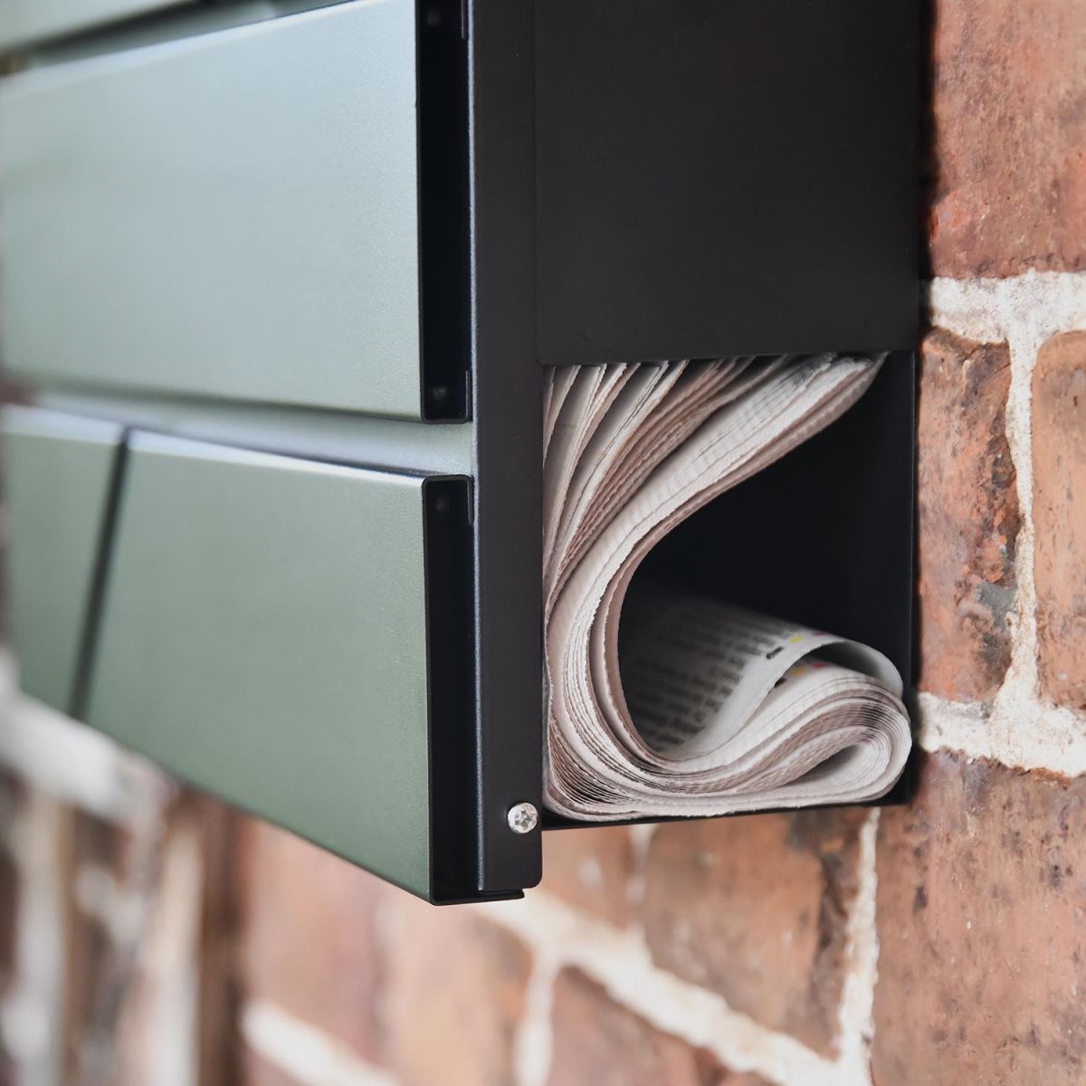 Newspaper holder on the Bottom of the "Arlington" Black Modern Wall Mounted Post Box