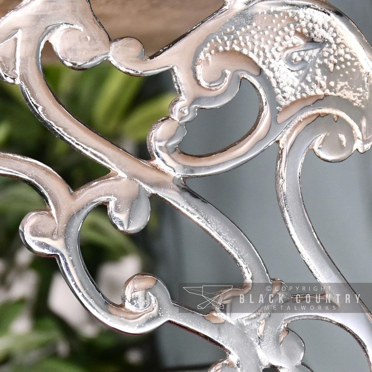 Close-up of the Ornate Detail on the Shelf Bracket