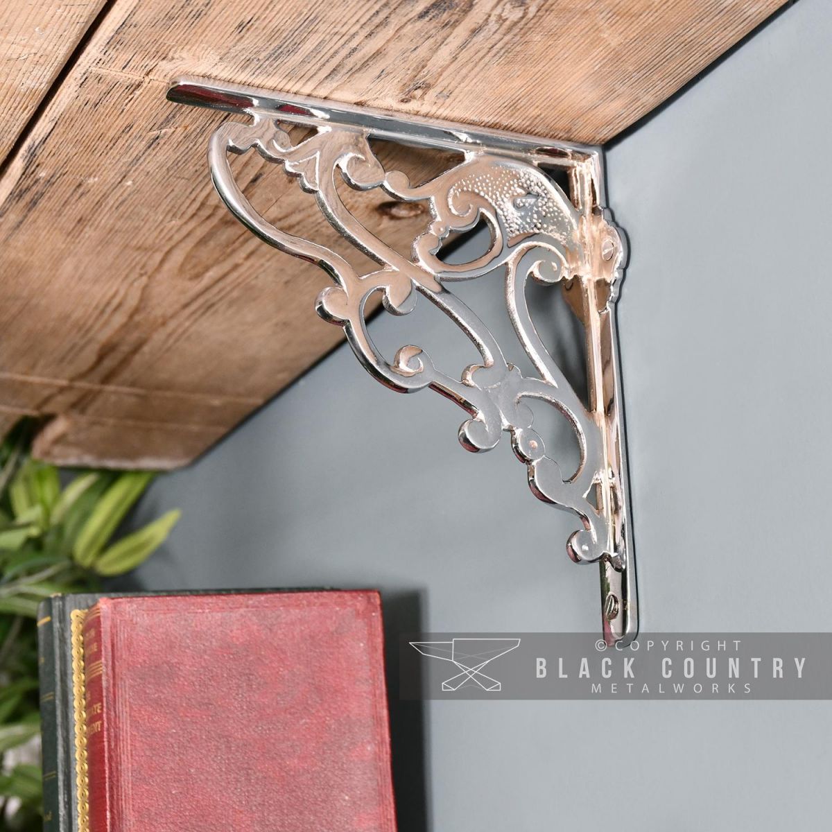 Polished Aluminium Ornate Bracket in Situ