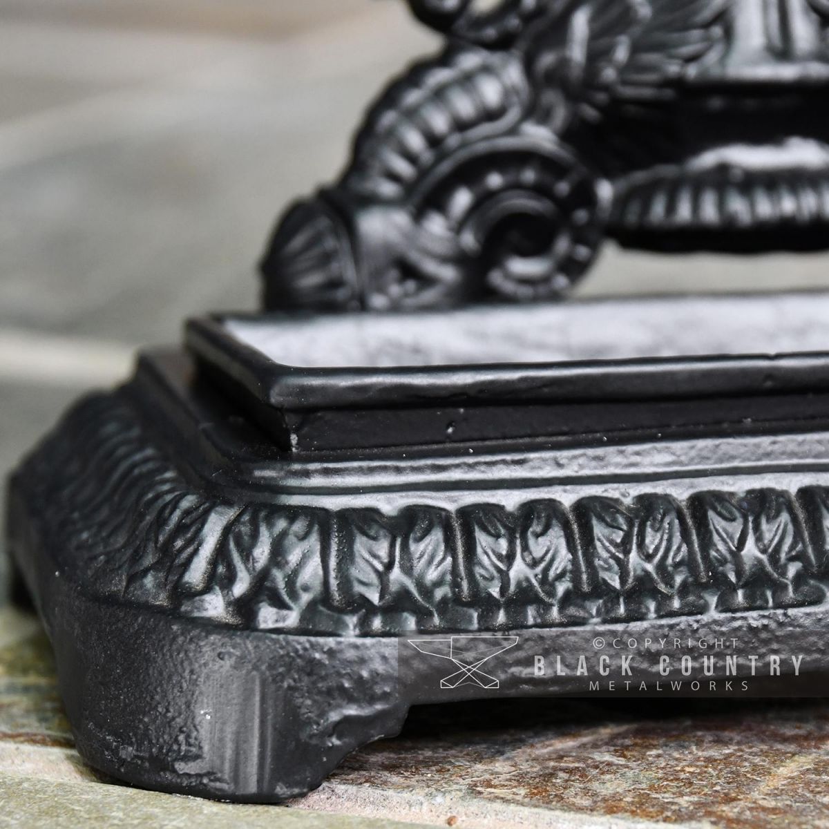 Close-up of the Detail on the Base of the Umbrella Stand