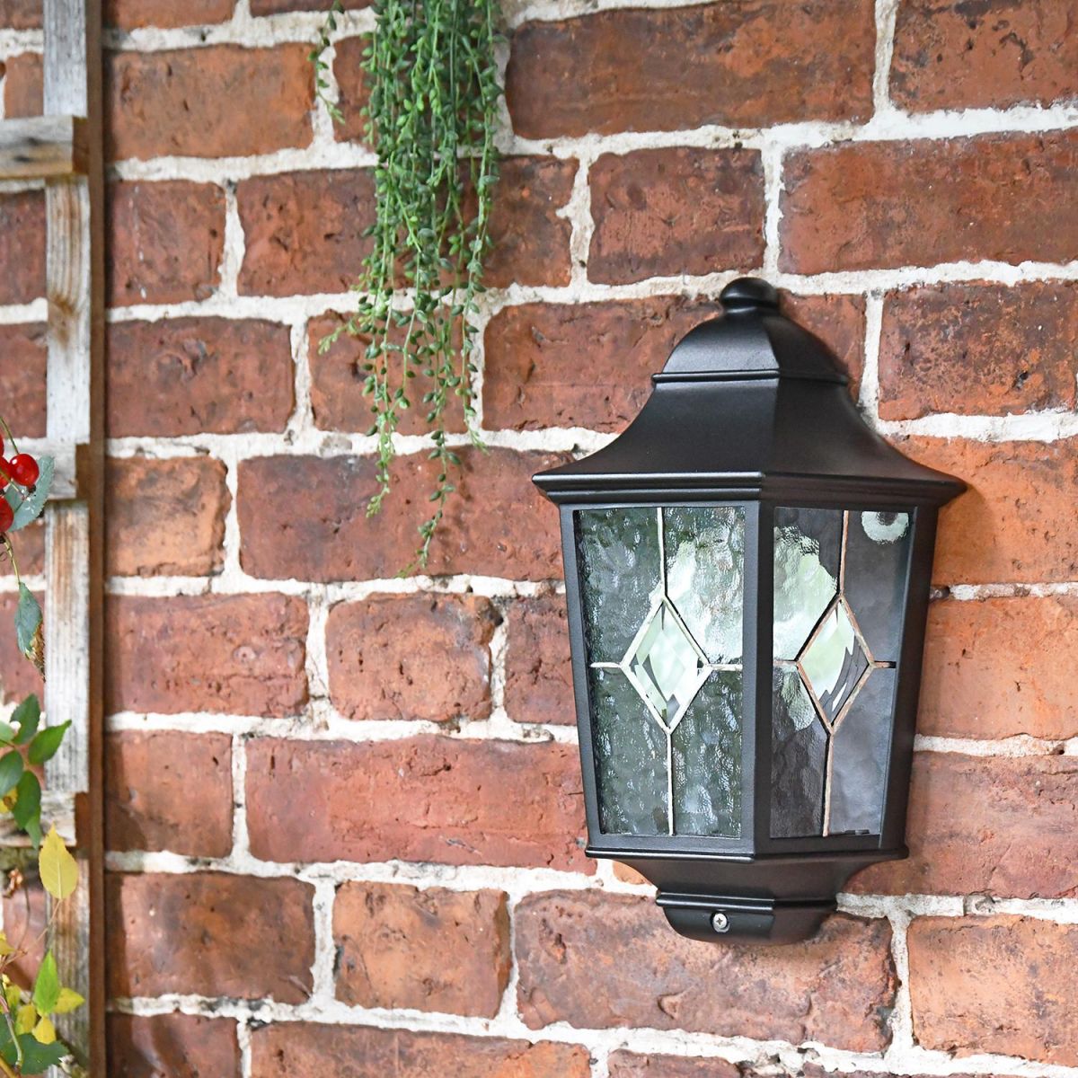 "Avebury Manor" Traditional Half Lantern Wall Light on a Brick Wall
