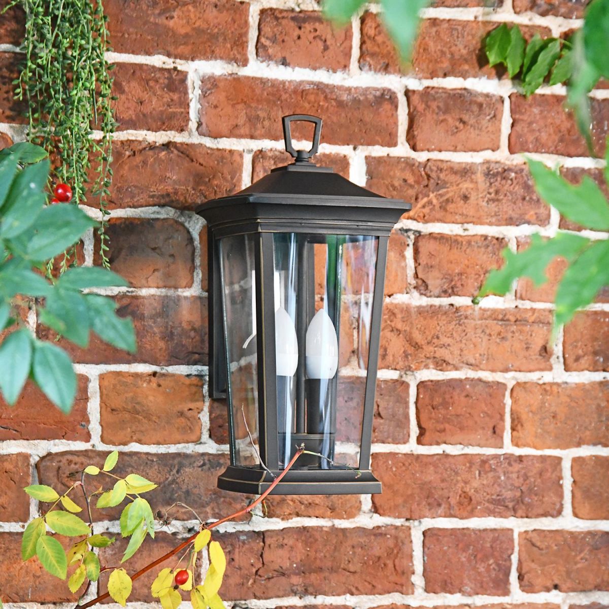 "Avebury" Medium Antique Bronze Wall Lantern on a Brick Wall