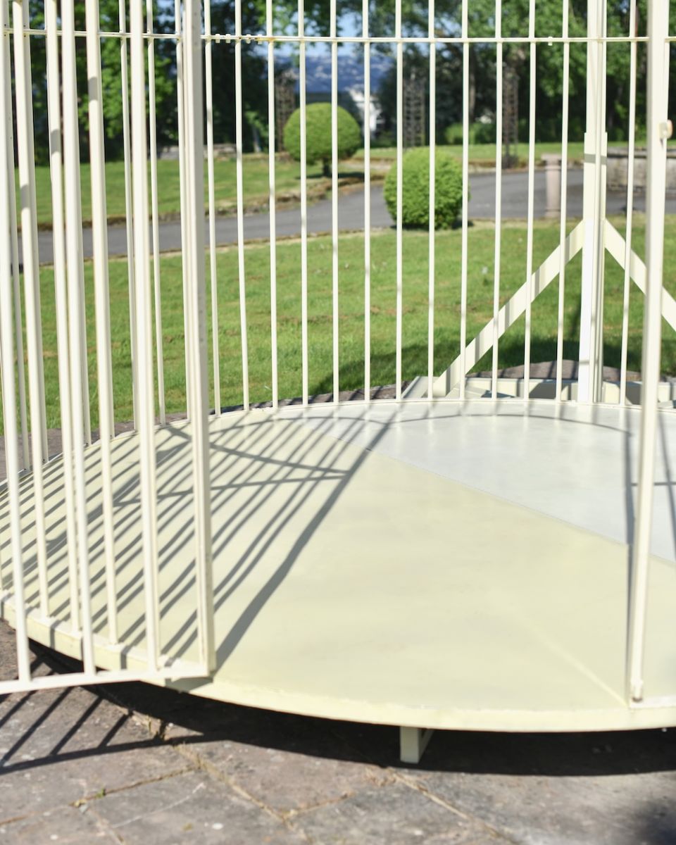 Close up of entrance and base of grand birdcage inspired gazebo Close up of entrance and base of grand birdcage inspired gazebo