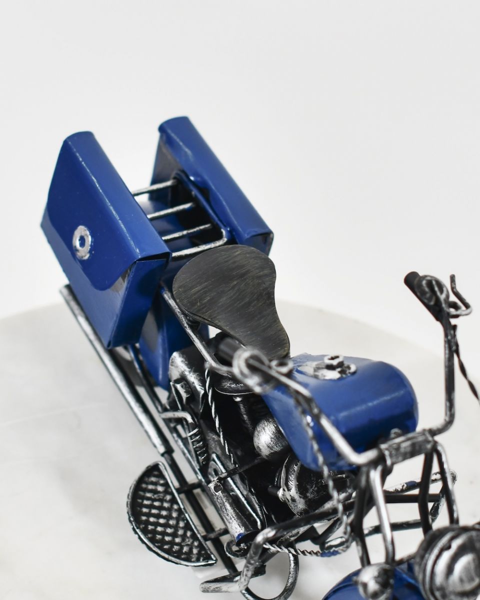 close up of back detail on blue motorbike sculpture close up of back detail on blue motorbike sculpture