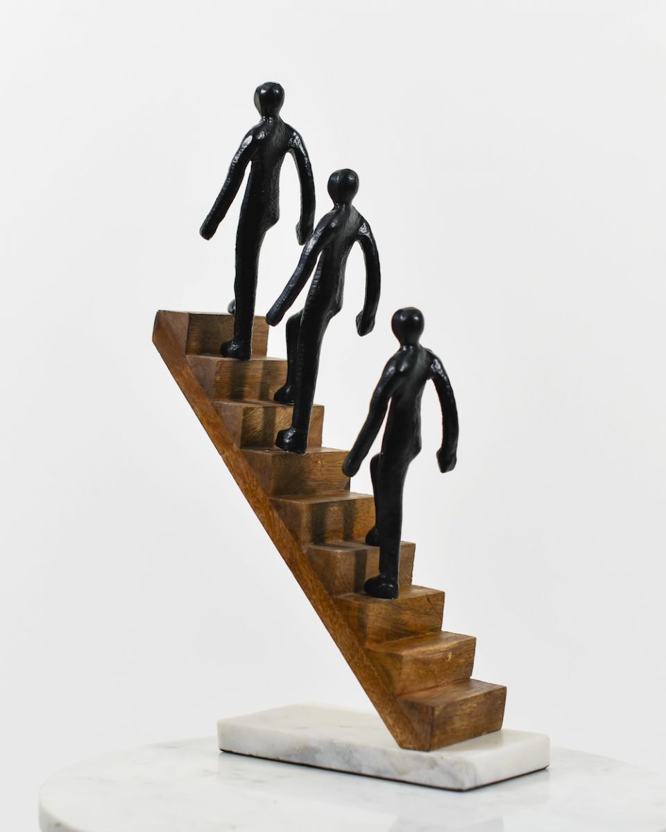 Back view of cast aluminium, mango wood and marble home sculpture Back view of cast aluminium, mango wood and marble home sculpture