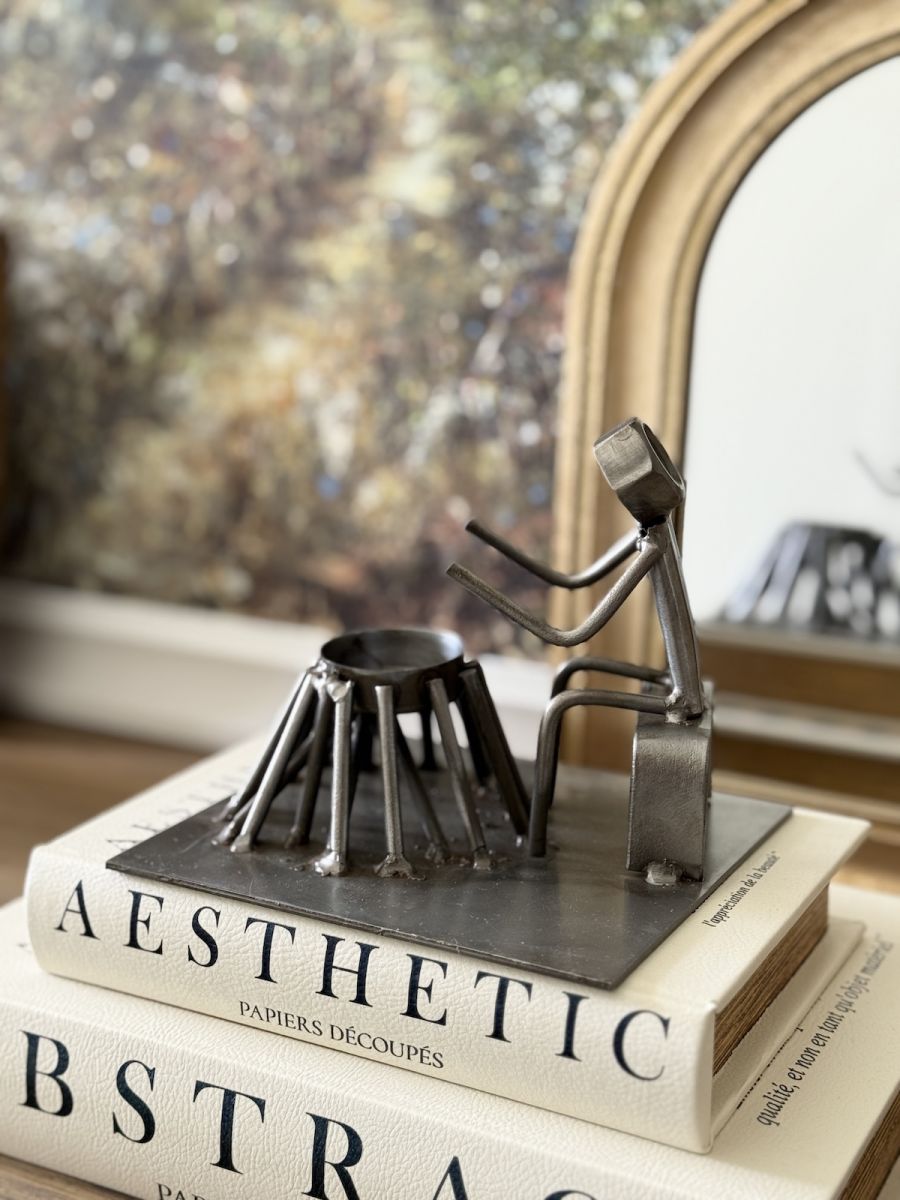 Angled view of metal tea light holder