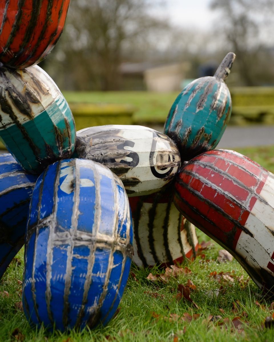 ‘Tangle’ the Balloon Dog Upcycled Oil Drum Garden Sculpture close up of body and legs of sculpture