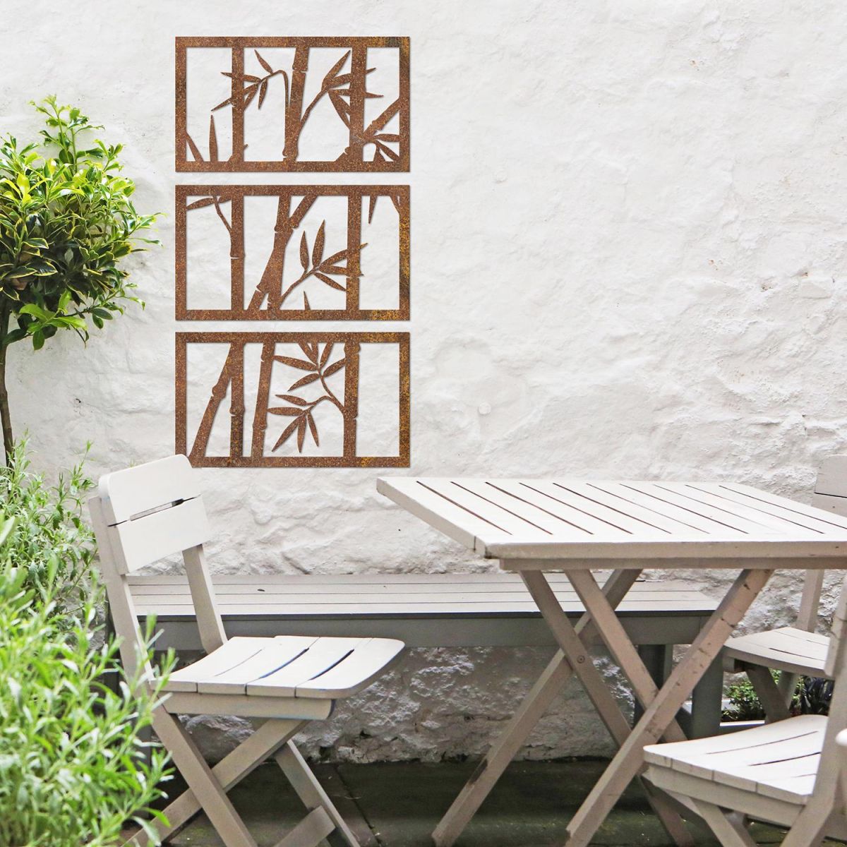 Bamboo Wall Art in Situ Above a Wooden Table & Chair Set