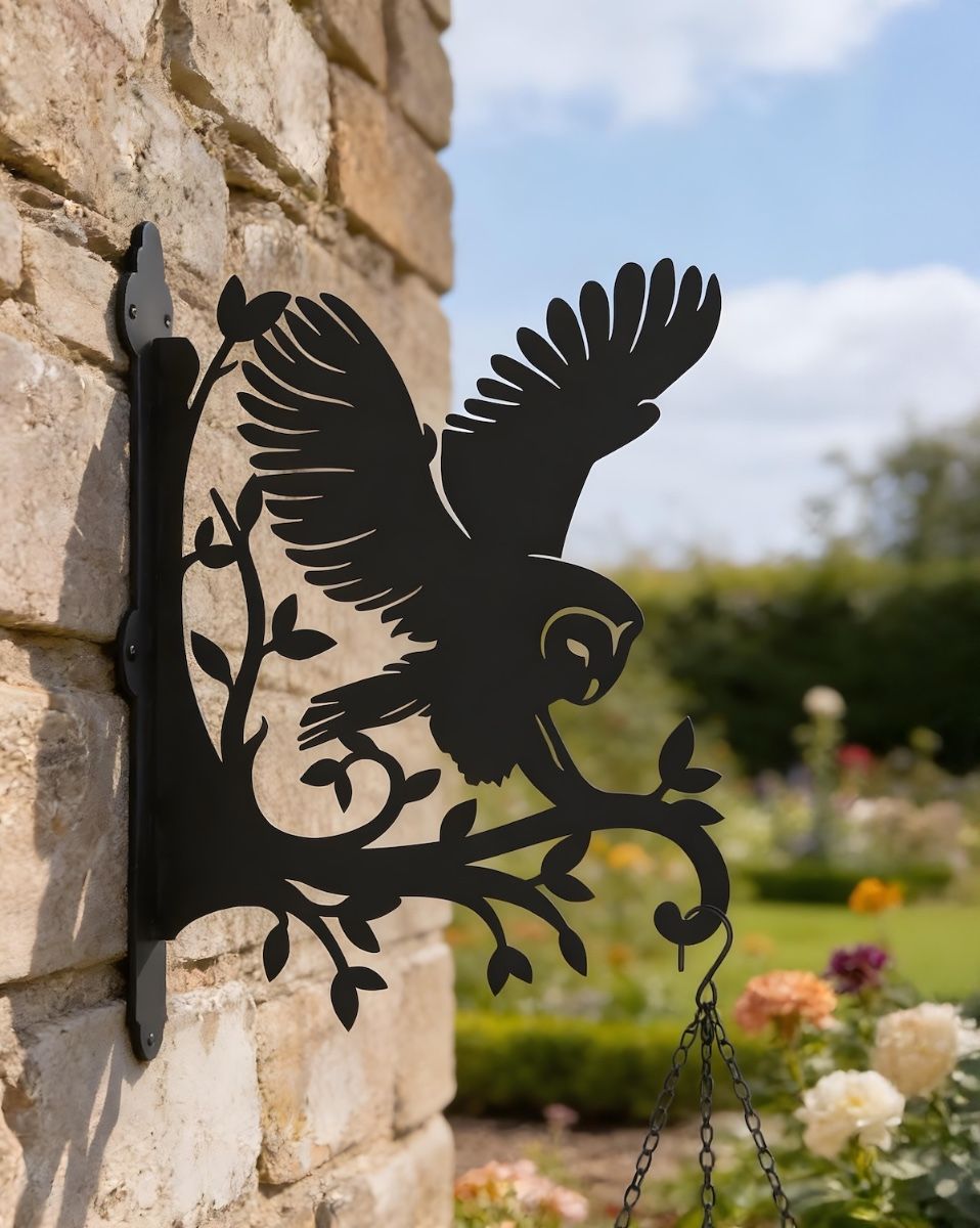 Barn Owl Hanging Basket Bracket mounted on a rustic brick wall
