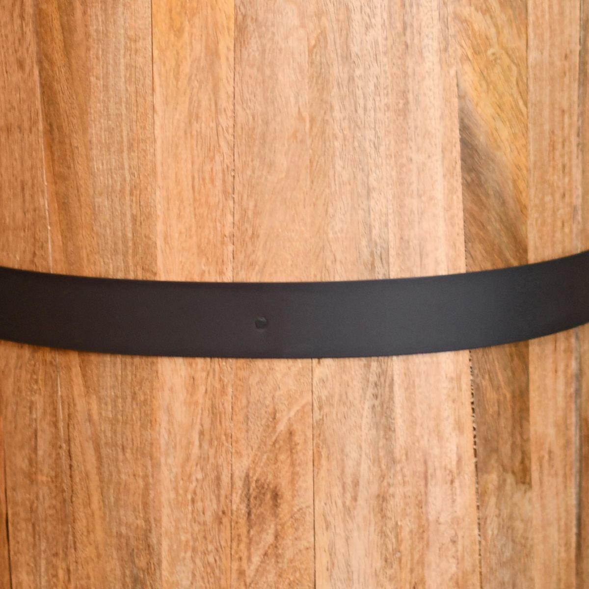 Close-up of the Wood with a Black Steel Strip