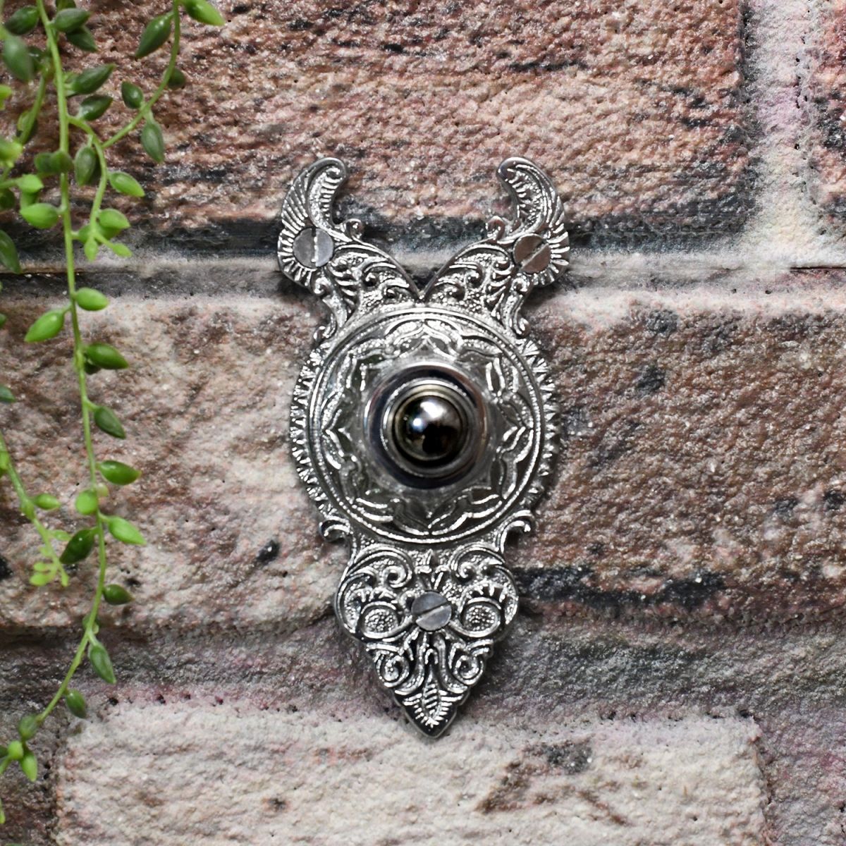 Old fashioned door bell with ornate detailing Old fashioned door bell with ornate detailing