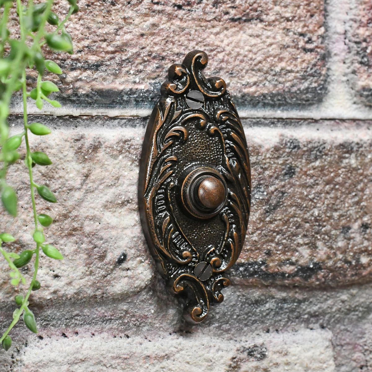 Exterior Door bell push button finished in burnished copper