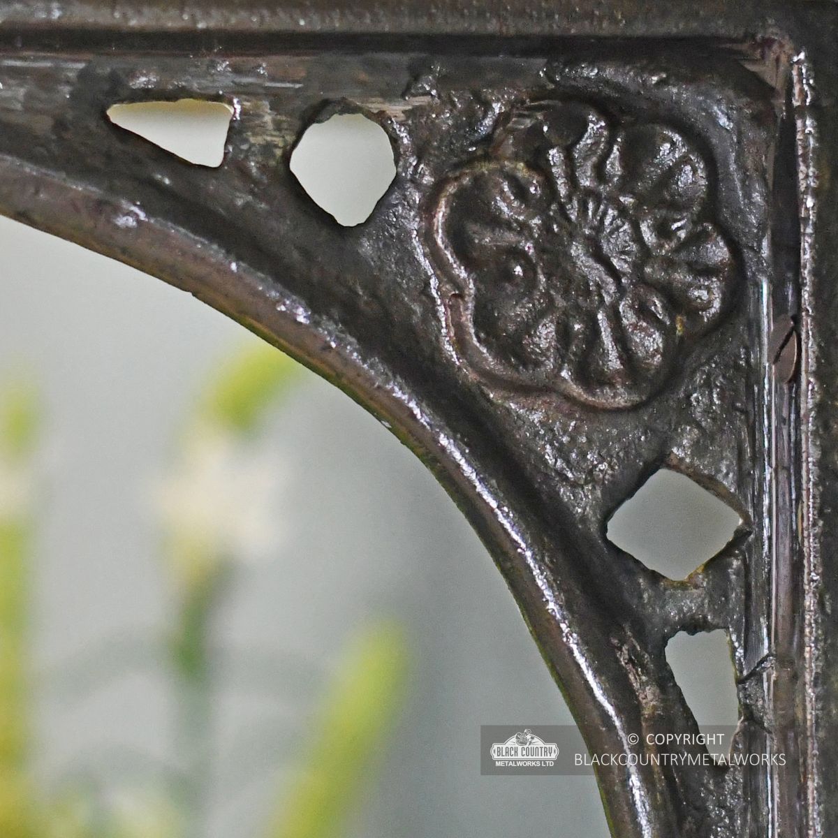Detailed image of cast Tudor rose motif