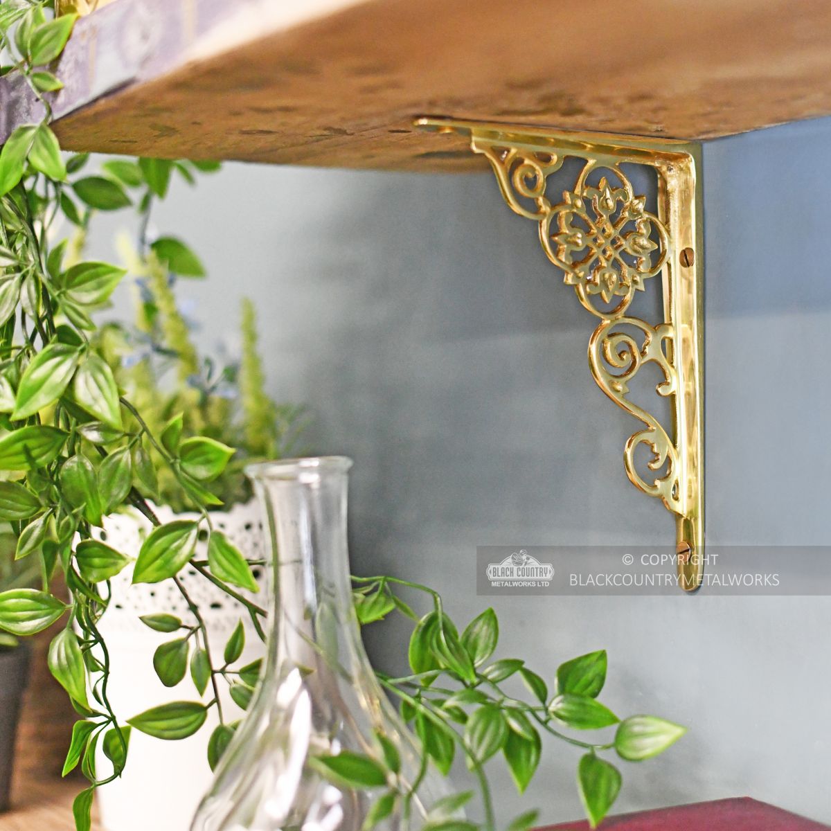 Interior shelving solution - brass shelf bracket