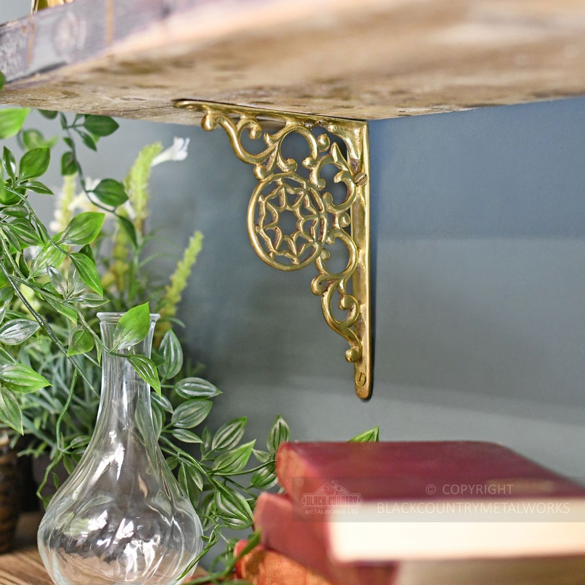 Beautiful unusual interior brass shelf bracket
