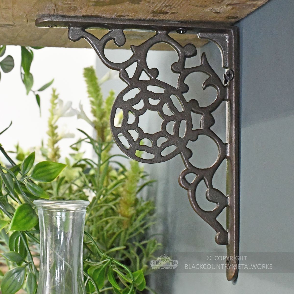 Unusual iron shelf bracket