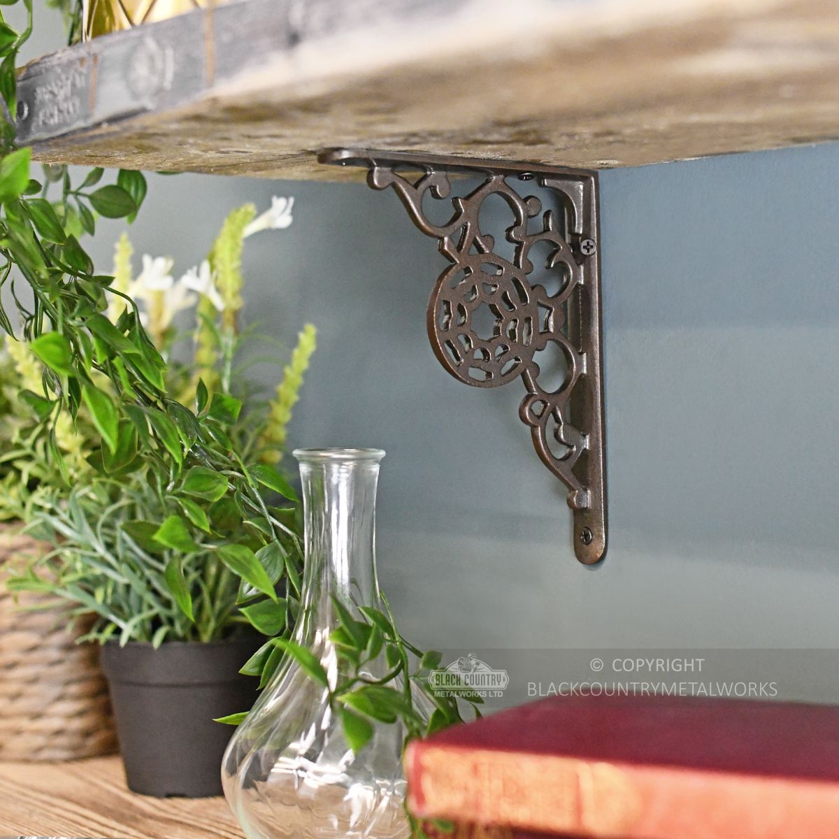 Ornate natural iron kitchen shelf bracket