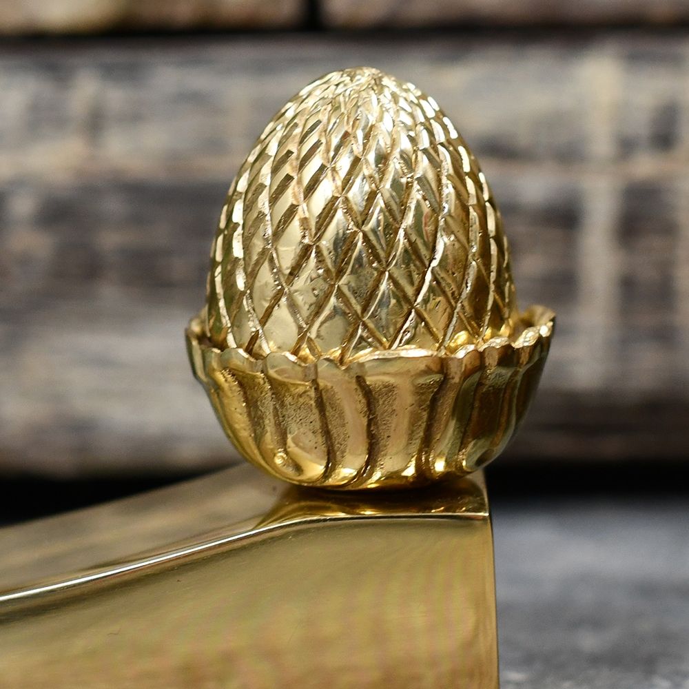Close up image of Acorn Finial on door wedge