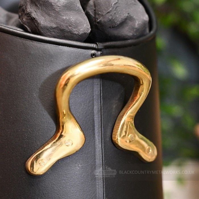 Polished Brass Handles on the Coal Hod