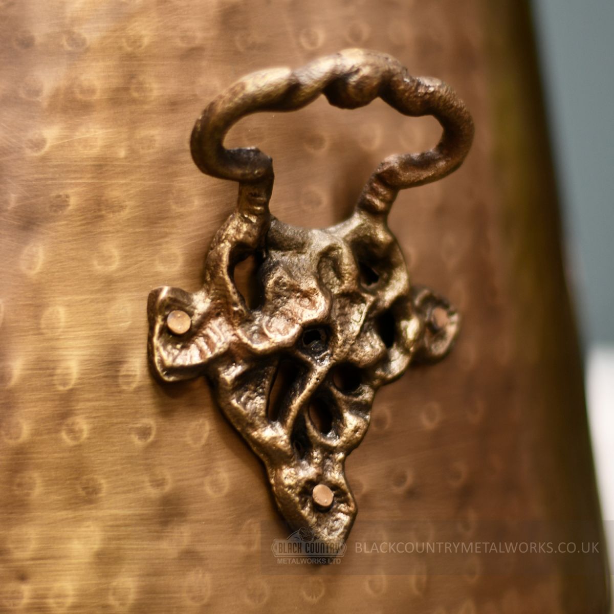 Detailed image of ornate support handle