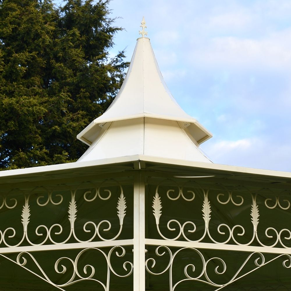 Slopping roof with ornate finial