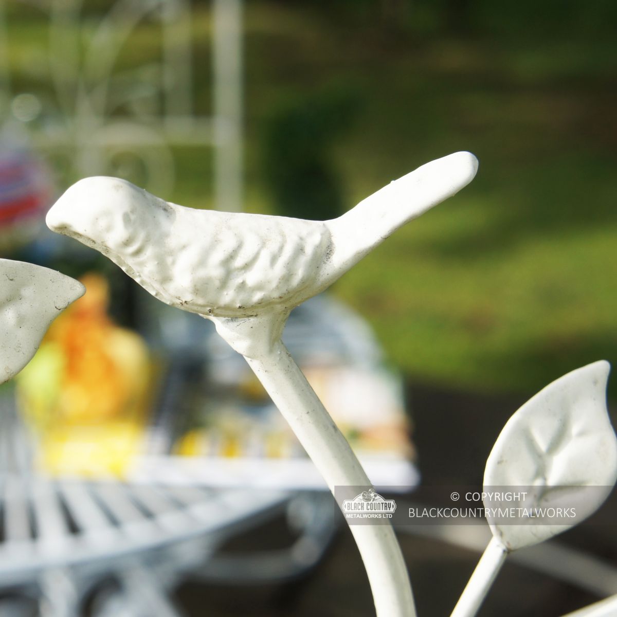 Detailed image of iron bird ornate detail