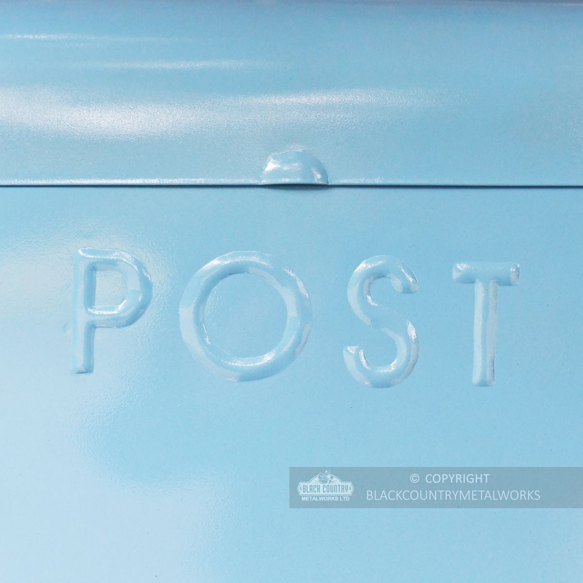 Embossed POST text on letter box