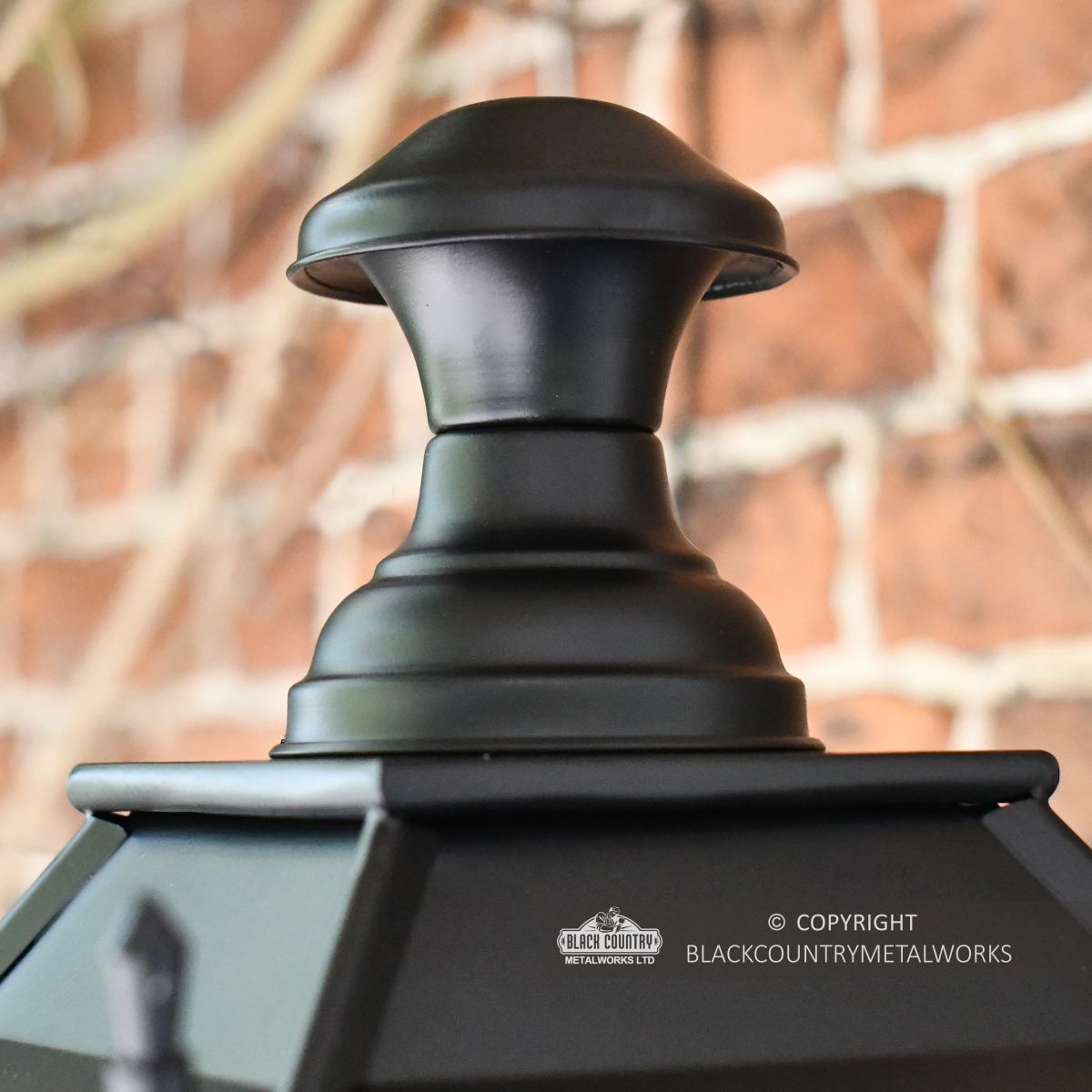 Close up image of Lantern Finial on outdoor gothic lantern