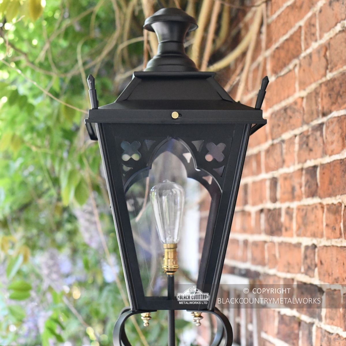 Church yard Gothic lantern on wall bracket