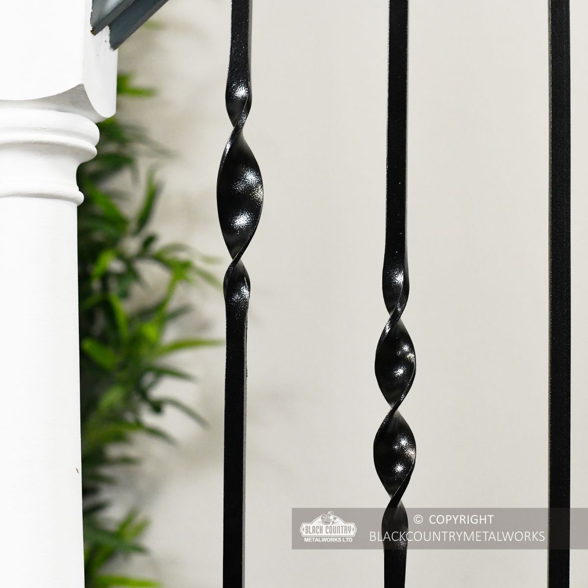 Detailed image of black stair spindle