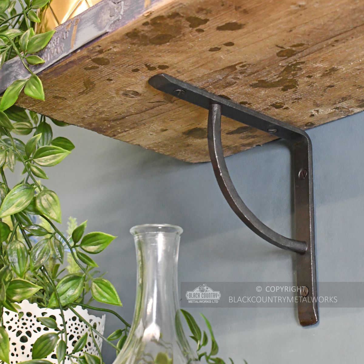 Blacksmith forged iron shelf bracket