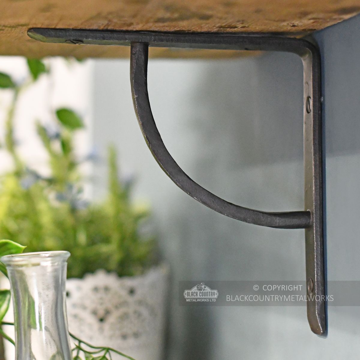 Beeswax finish simplistic arched shelf bracket