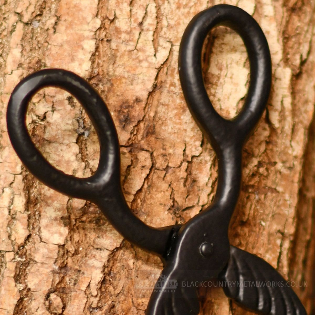 Close up of Iron hand tong handles