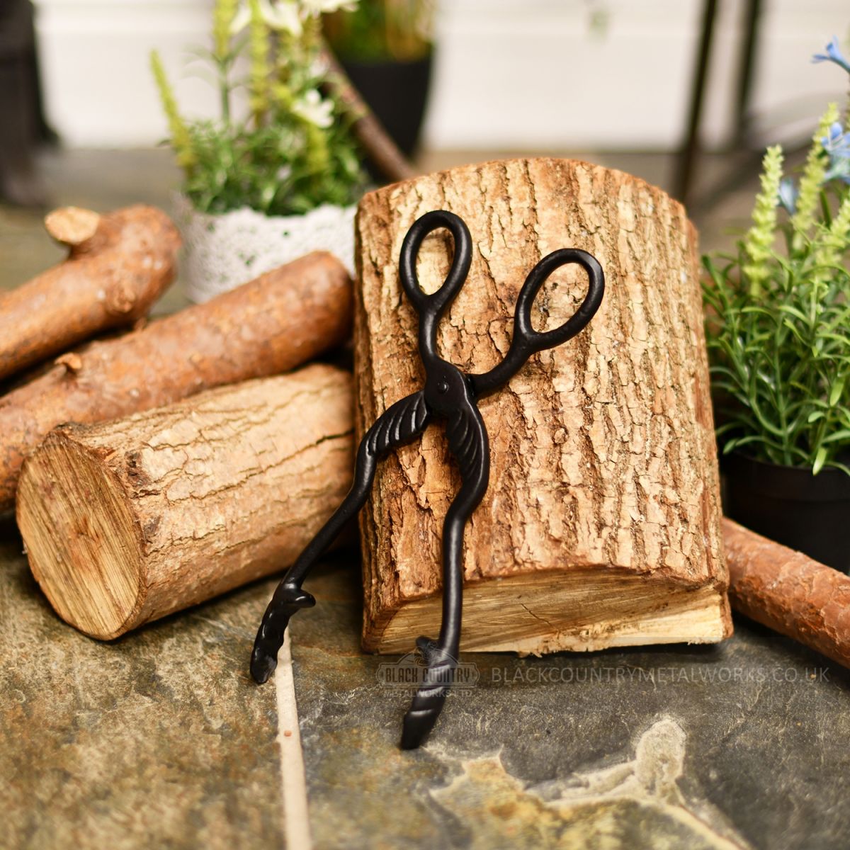 Beautiful hand forged wood burner tongs can be used for coal
