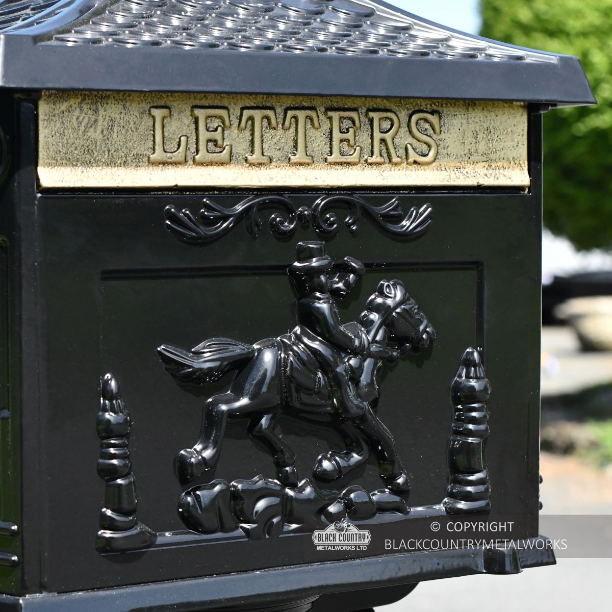 Cast Aluminium letter box with horse and jockey detail