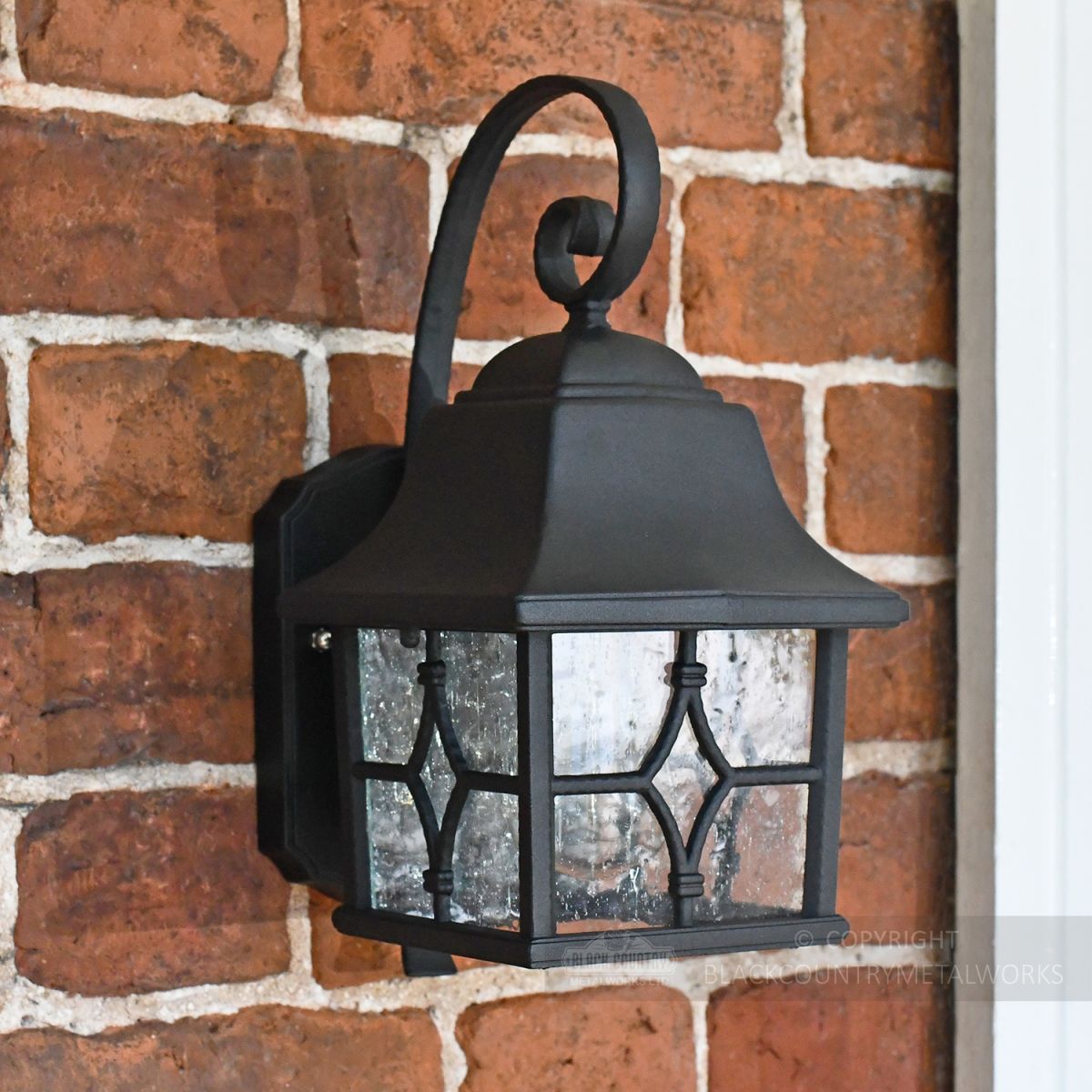 Exterior wall lantern with mottled glass
