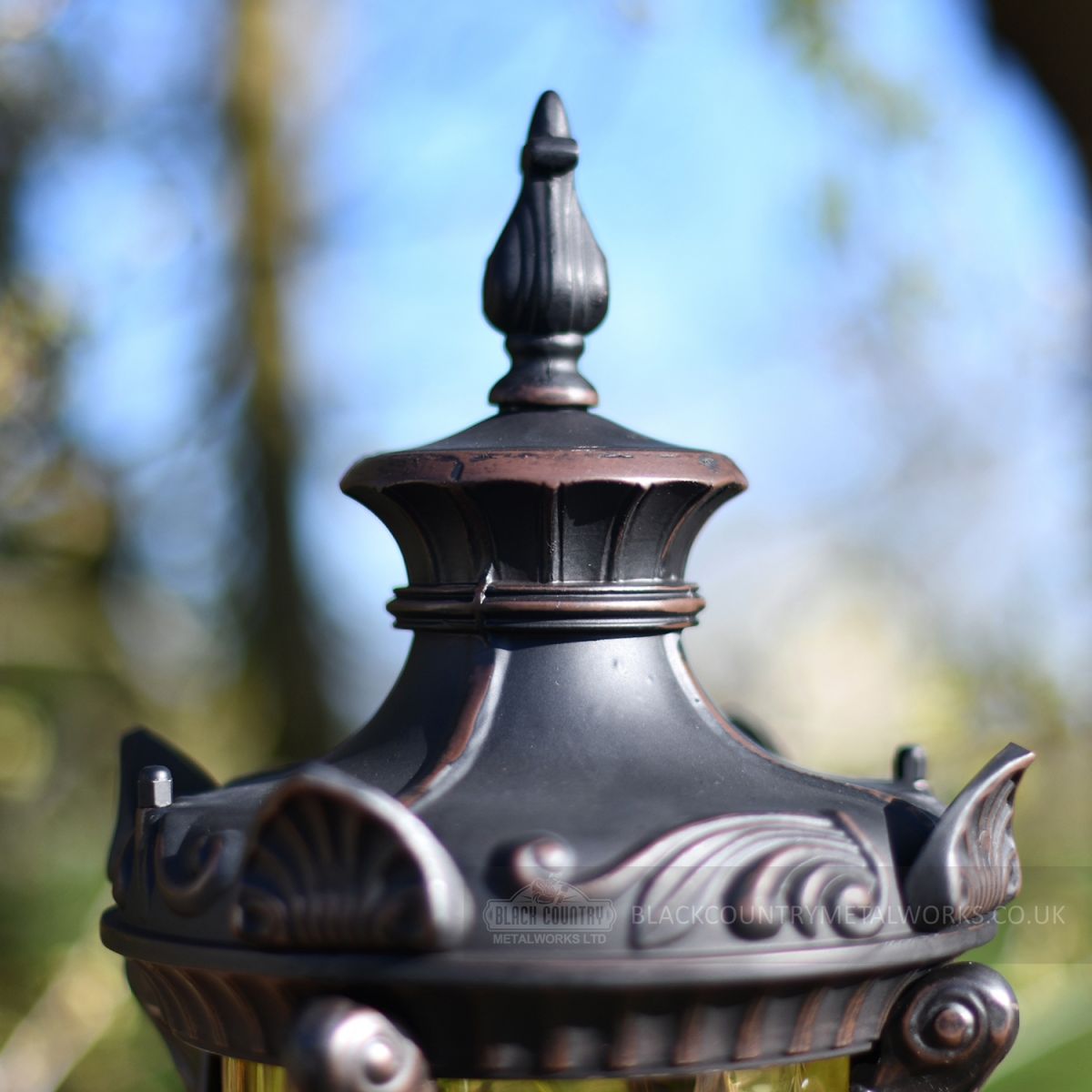 Close up of finial on pillar lantern