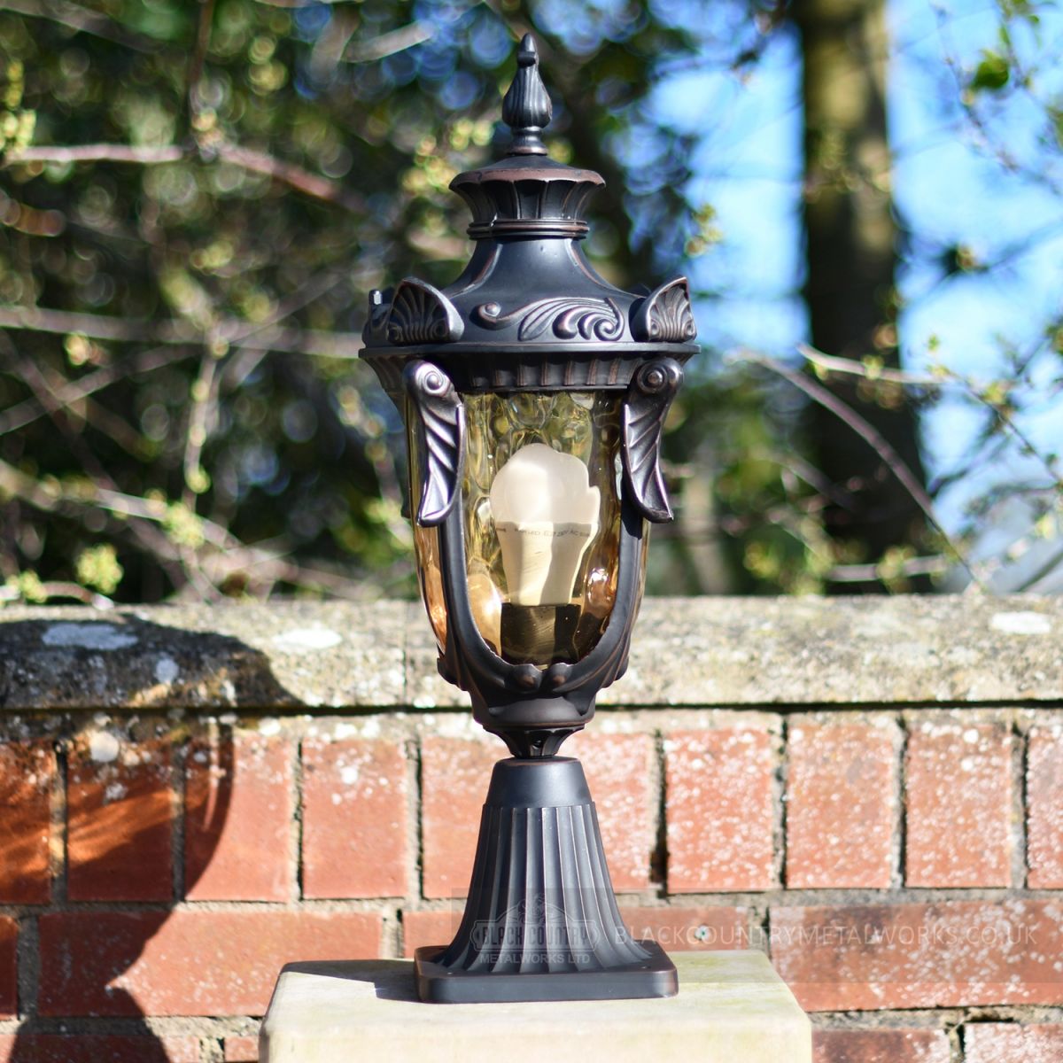 Front Gate lighting finished in aged bronze