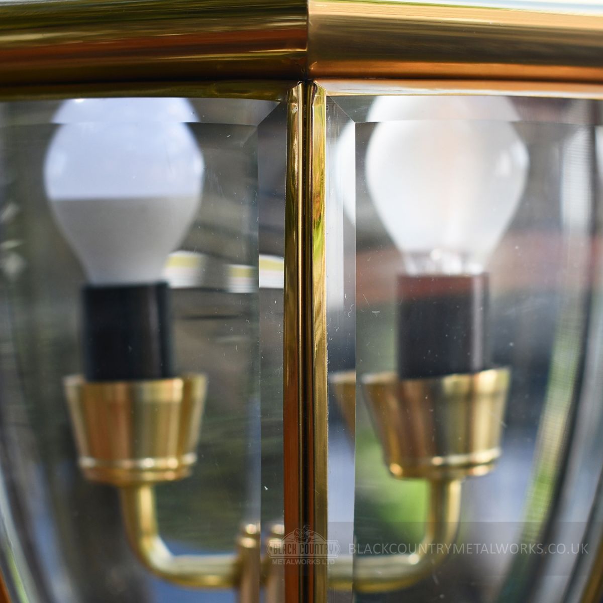 Close up of glass panes on large driveway pillar light