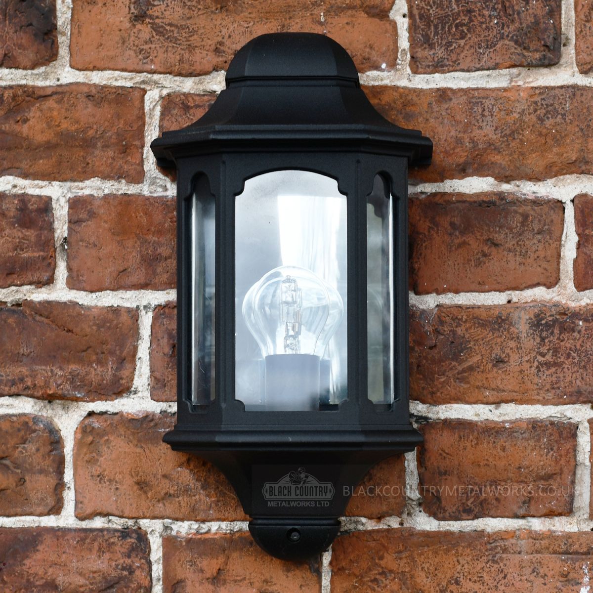 Exterior wall lantern finished in black