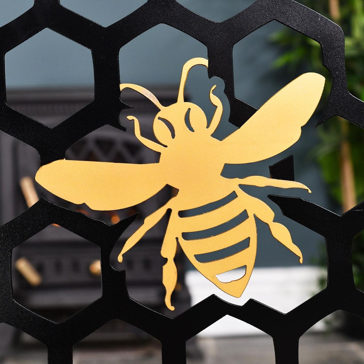Gold Bee on the Black Bee Fireguard