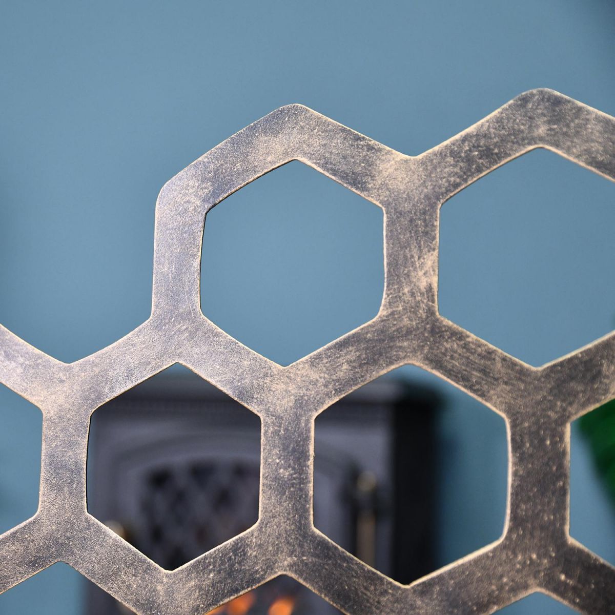 Close-up of the Antique Gold Finish on the Bee Fireguard