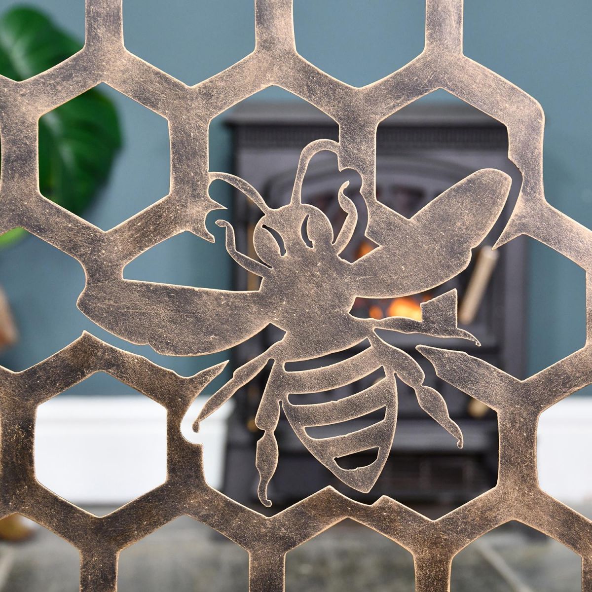 Antique Gold Bee on the Bee Fireguard