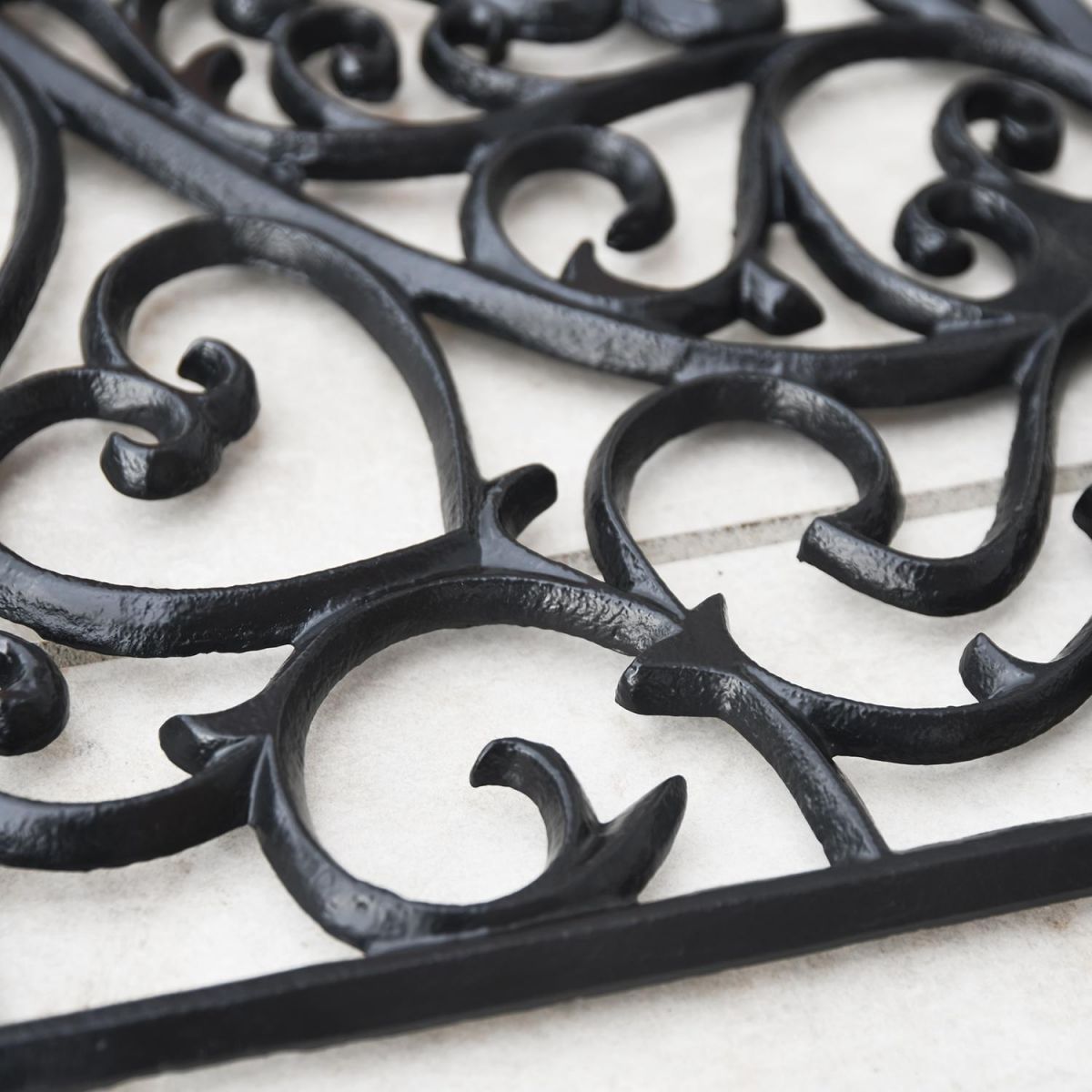 Close-up of the Ornate Design on the Doormat