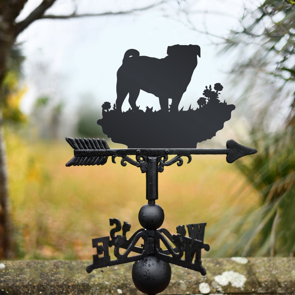 Pug dog weathervane in garden finished in black Pug dog weathervane in garden finished in black