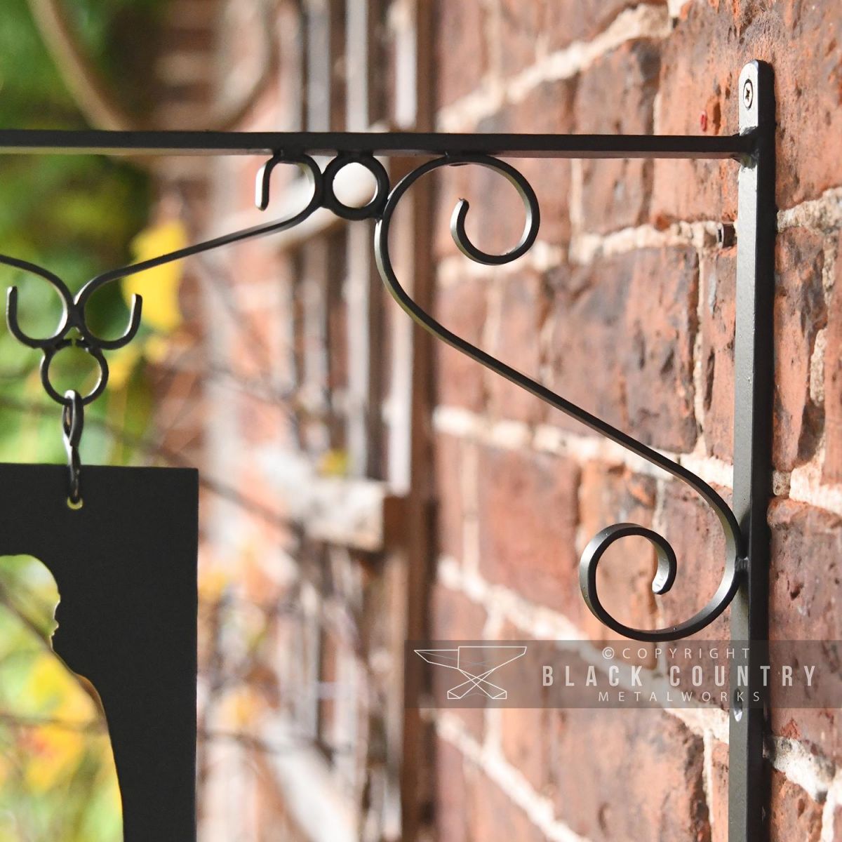 Close-up of the Scrolled Hanging Sign Bracket