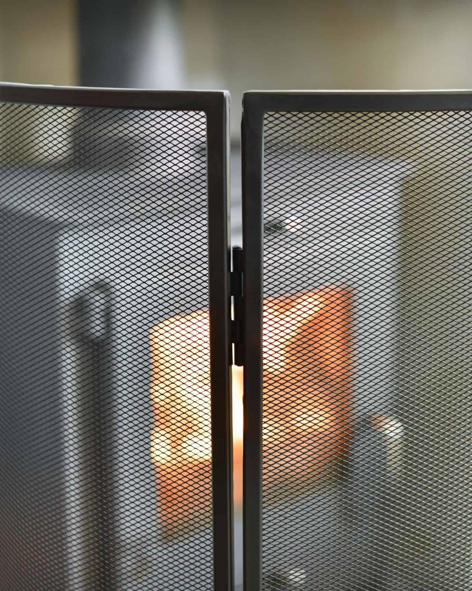 Close-Up of Hinges & Integral Mesh on Black "Fortress" Curved Three Fold Fireguard