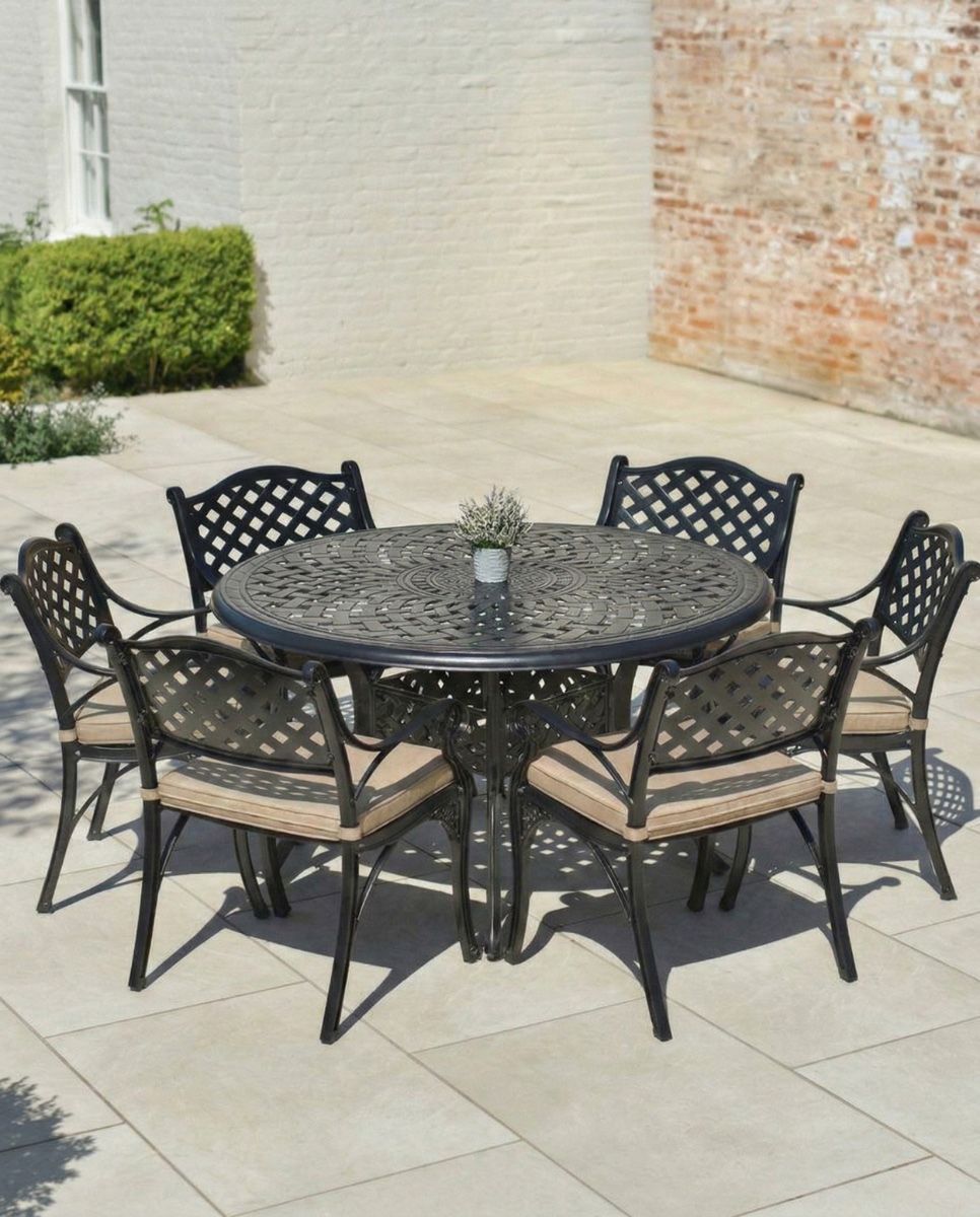 Black "Milford" Six Seater Furniture Set in Situ Outside on a Garden Patio with cushions