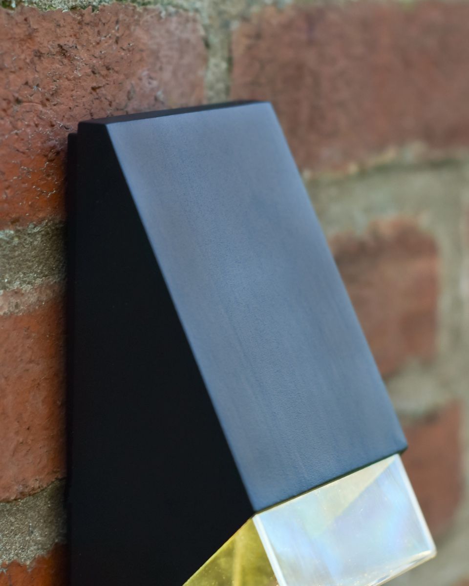 Black angled wall light upper casing