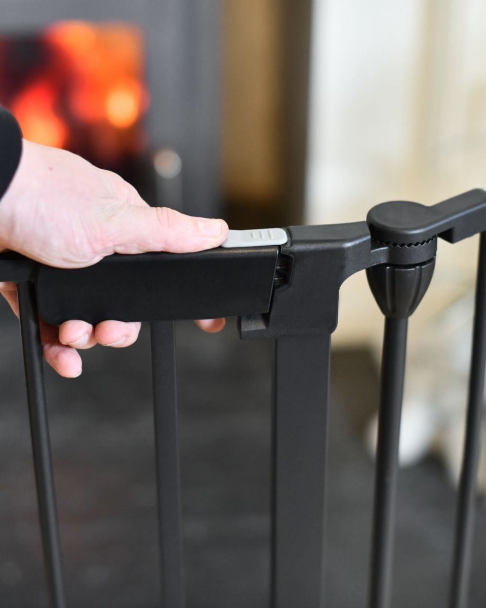Close up of Five Panel Fire Surround Baby Guard handle Close up of Five Panel Fire Surround Baby Guard handle